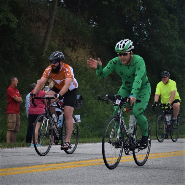 This Sunday bike pic, looking through the archive, we found a picture of the biker dude, in green lycra, riding across Iowa.