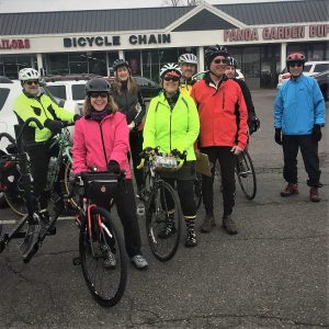 Participants on the HBC Progressive Ride I in Roseville leaving the Bicycle Chain Bike Shop