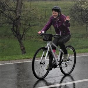 This Saturday bike pic shows a biker chick, having fun, riding in the rain and hoping for a sunny afternoon for her ride home.