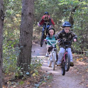 This wheelie Wednesday Bike Pic, we caught this family out having fun on the trail celebrating day three of 30-days of biking.