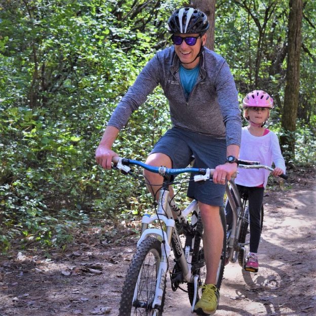 This Bike Pic Tuesday, we captured this biker dude and his daughter enjoying some time riding together, while the trail stays dry.