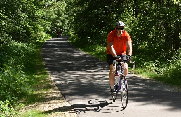 This cyclist is riding out of Stillwater on the new Browns Creek Bike Trail that connects to the Gateway Trail, into St. Paul.