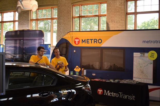 Metro Transit demonstrating alternate transportation options and how to put your bike on a bus.