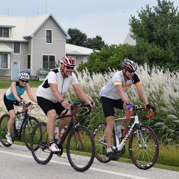 Here a group of cyclists enjoy exploring the scenic roads by bike, that circle and cross the Root River Trail, in Southeast Minnesota's Bluff Country. Ride and explore the areas trail and roads, July 9 -11, 2016 on the Root River Bluff & Valley Bike Tour.