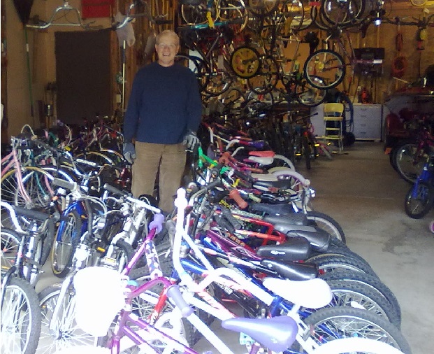 Rick Anderson with a wide assortment of bikes ready for the sale. 