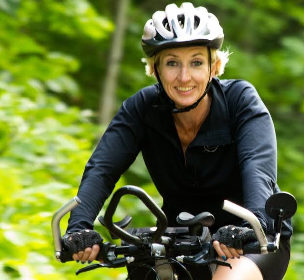 Here is Cheryl Sima on her bike enjoying the flora and fauna of the U.P. 